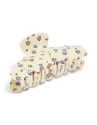 Showcasing a tweens acrylic diamante and flower print hair claw clip with floral leaf details in wheat, slate blue, dark olive green, and chunky styling detail view - link has visual effect only
