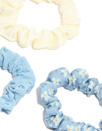 Crafted from daisy flower and checkered fabric scrunchies in a 5-pack with light blue, ivory, white side view - link has visual effect only