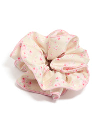 Crafted with floral print in misty rose, pink, and light pink tones, this Tweens Rose Daisy Scrunchie is shown in a front view - link has visual effect only