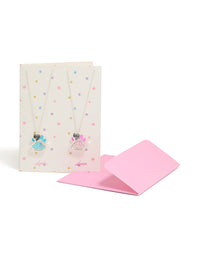 Showcasing kids silver best friends paw shaker necklaces in a 2-pack featuring dog, charm with heart script glitter pendant front view - link has visual effect only