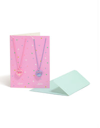 Discover kids coated metal glitter heart pendant best friends necklaces in pink purple lavender 2-pack front view - link has visual effect only