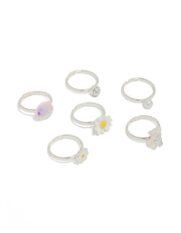 Showcasing a 6-pack of kids' silver-plated rings featuring animal, bear and daisy - floral designs with glitter, pearl, and enamel accents in white, yellow, and lavender, front view - link has visual effect only