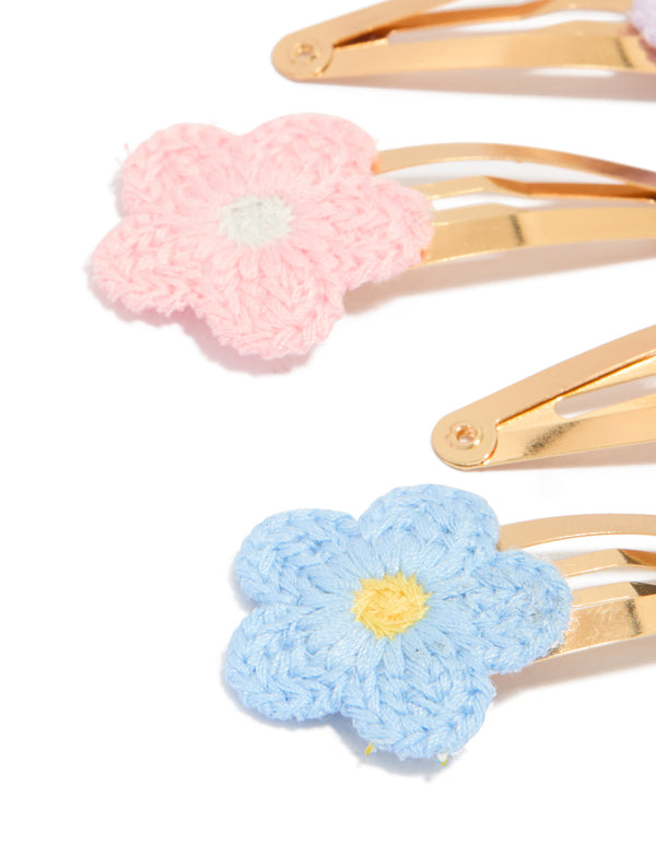 Designed with kids pastel crochet flower snap clips in a 4-pack, featuring floral pattern with gold plated material in pink, lavender, yellow, and light blue detail view