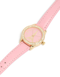 Discover this kids gold Eiffel Tower watch on a round dial with pink strap crafted from PU leather, designed for casual analog wear watch face detail view - link has visual effect only