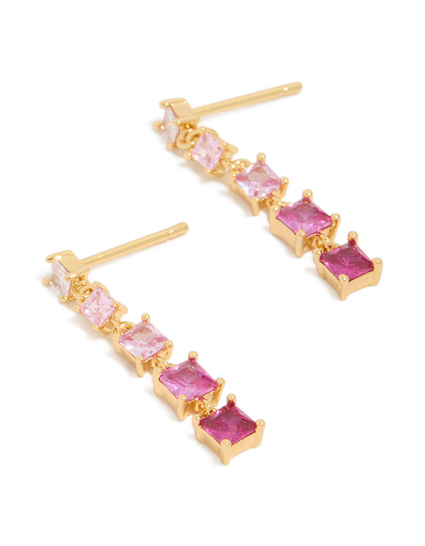 Beautiful gold pink cubic zirconia gradient drop earrings with statement style front view