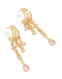 Showcasing statement hoop earrings with star celestial charms crafted from gold plated cubic zirconia in light pink and clear front view - link has visual effect only