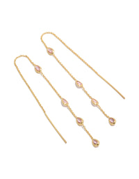 Crafted from gold plated metal, these pear pink diamante station threader earrings are shown in a front view - link has visual effect only