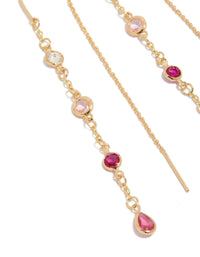 Elegant gold plated pink and clear cubic zirconia thread through drop earrings close up view - link has visual effect only