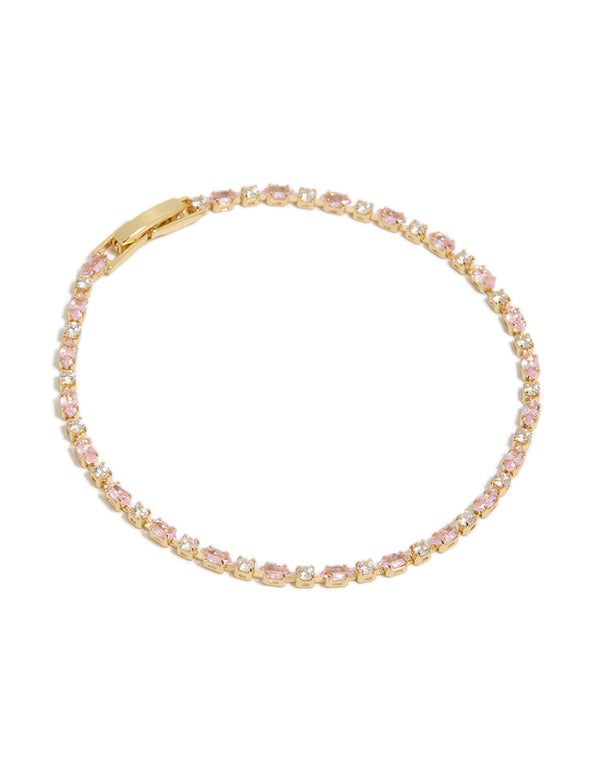 Discover this gold plated tennis bracelet featuring pink and clear cubic zirconia in mixed cut front view