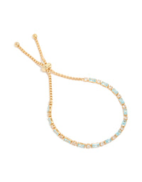 Discover this gold plated toggle bracelet featuring clear and aqua baguette cut cubic zirconia stones front view - link has visual effect only