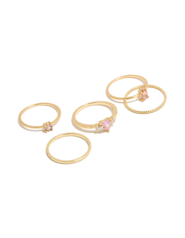 Featuring gold plated pink heart cubic zirconia and molten rings in a 5-pack with crystal accents front view