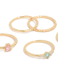 Highlighting crystal embellished rings in a set of five with detailed stone settings close up view - link has visual effect only