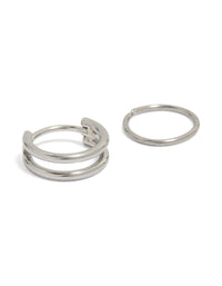 Featuring surgical steel double hinged and plain hoop nose rings in silver front view - link has visual effect only