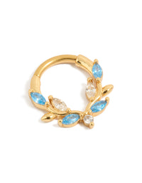 Showcasing vine design gold plated titanium clicker ring with blue cubic zirconia front view - link has visual effect only