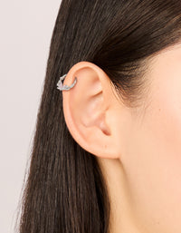 Featuring a titanium pink cubic zirconia butterfly clicker ring in silver and light pink worn on ear view - link has visual effect only