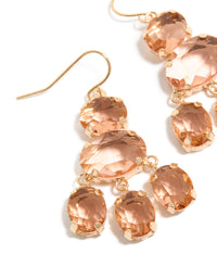 Featuring gold pink stone charm hook drop earrings close up view - link has visual effect only