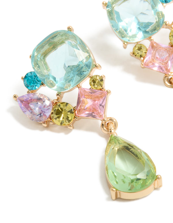 Featuring statement drop earrings in gold featuring cluster diamante stones with blue, green, and pink tones close up view