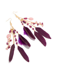 Showcasing statement drop earrings with beads, charms, and feathers in purple, gold, and pink front view - link has visual effect only