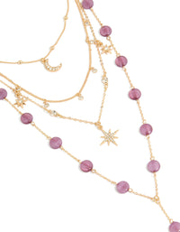 Beautifully crafted gold flat purple beaded celestial layered y-necklace featuring charms, star and moon pendants close up view - link has visual effect only