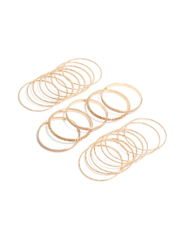 Featuring gold pink diamante bangles in a stackable 21-pack, front view