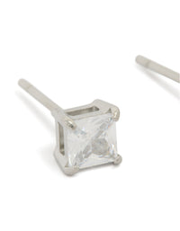 Highlighting mens waterproof mini square clear cubic zirconia stud earrings in stainless steel with silver finish close up view - link has visual effect only