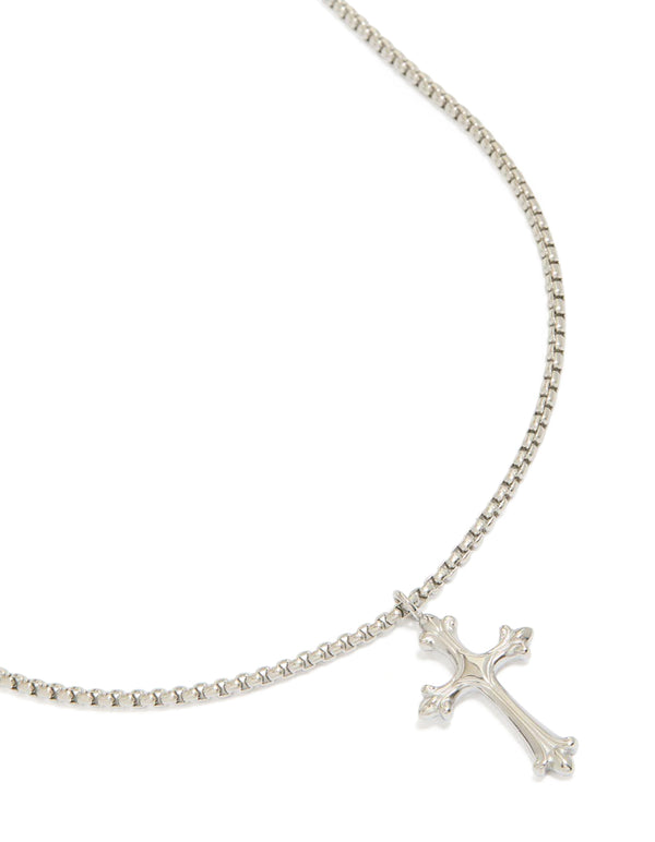 Showcasing a waterproof stainless steel gothic cross necklace with pendant in silver close up view