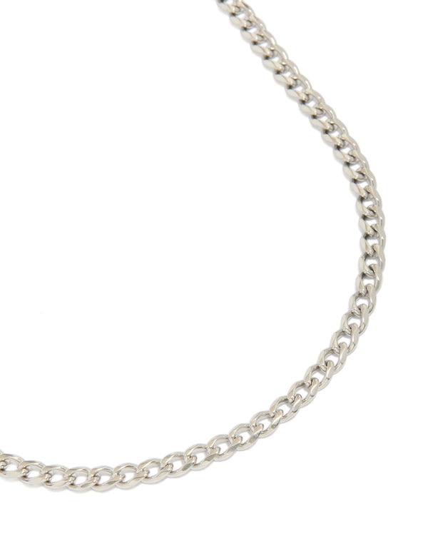 Showcasing a mens waterproof stainless steel classic curb link necklace in silver close up view