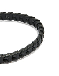 Highlighting the intricate braid pattern of a mens waterproof black coated stainless steel and PU leather bracelet close up view - link has visual effect only