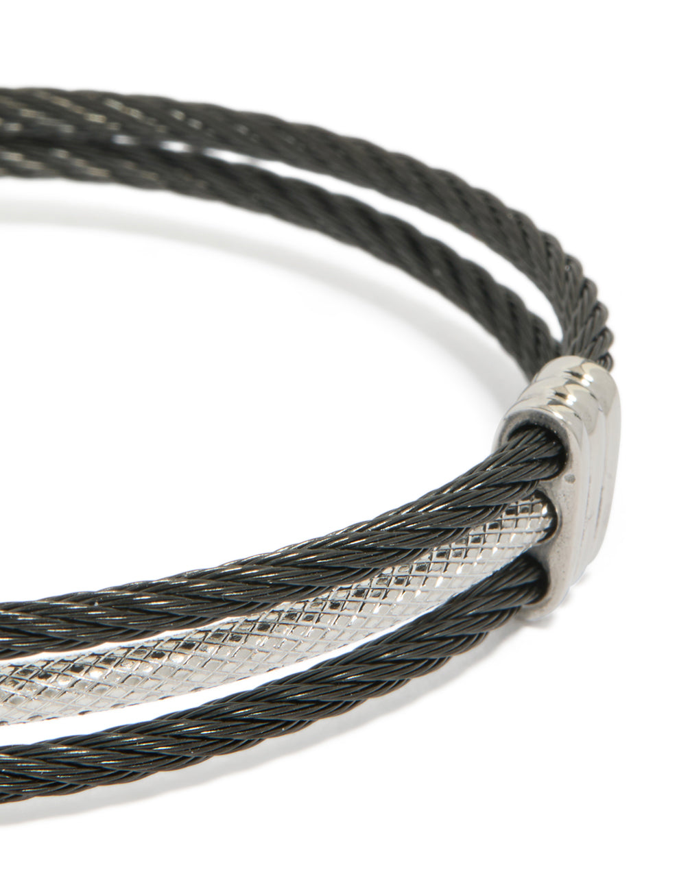 Highlighting a mens waterproof stainless steel black and silver wire twisted wrist cuff bracelet close up view