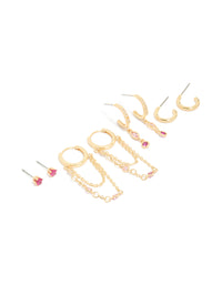 Showcasing gold plated dark pink cubic zirconia stacker earrings 4-pack featuring crystal embellishments huggie and stud closures in hot pink and light pink front view - link has visual effect only