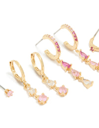 Beautifully crafted stacker earrings in gold plated finish with clear and light pink cubic zirconia crystals, huggie closures, 4-pack close up view - link has visual effect only