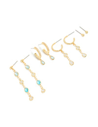 Beautifully arranged gold plated blue and clear cubic zirconia stacking earrings 4-pack featuring crystal huggie and stud closures front view - link has visual effect only