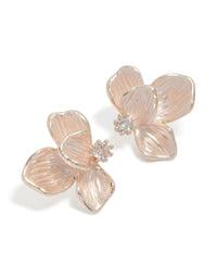 Showcasing floral stud earrings crafted from rose gold plated material with cubic zirconia accents in a design front view - link has visual effect only