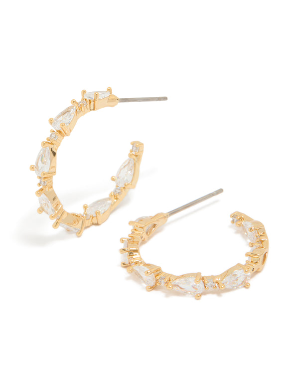 Showcasing teardrop medium open hoop earrings crafted from gold plated material with cubic zirconia stones in clear front view