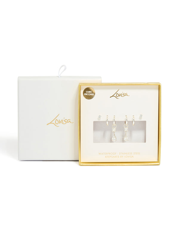 Featuring stainless steel cubic zirconia mixed drop hoop earrings in a 3-pack with crystal waterproof design and stud closure on close up view