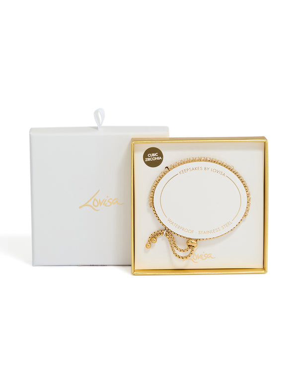 Discover this waterproof gold plated stainless steel tennis toggle bracelet with cubic zirconia in packaging view