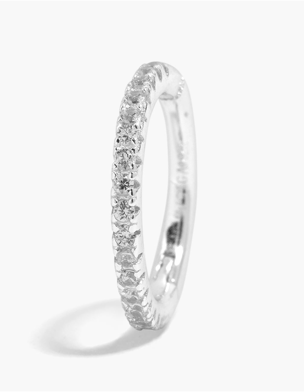Showcasing a clicker earring crafted from sterling silver featuring cubic zirconia stones front view