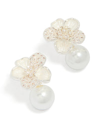Showcasing silver plated cubic zirconia flower and pearl drop earrings front view - link has visual effect only