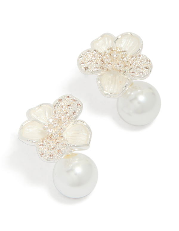 Showcasing silver plated cubic zirconia flower and pearl drop earrings front view