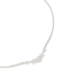Dainty floral cupchain necklace crafted from silver plated material with cubic zirconia close up view - link has visual effect only