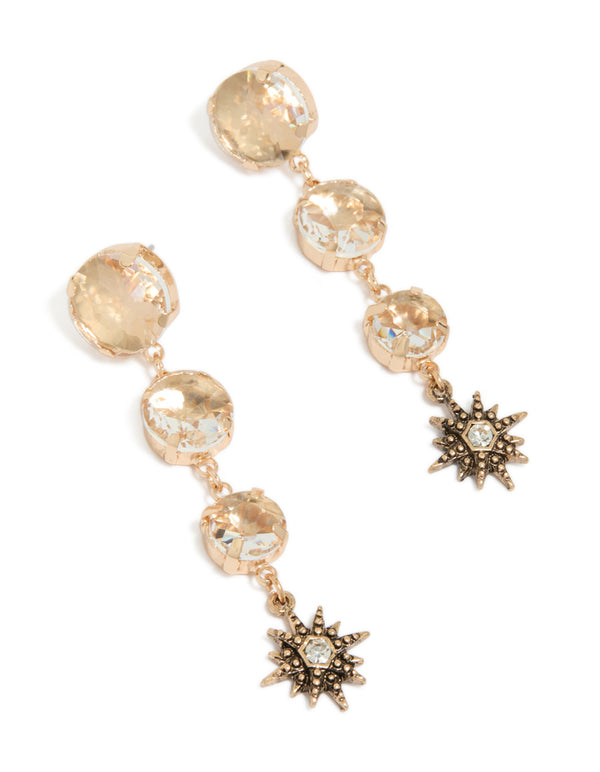 Showcasing gold triple jewel drop earrings featuring celestial star front view