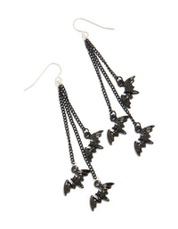 Showcasing multi chain bat drop earrings featuring charms in black and silver tones front view - link has visual effect only