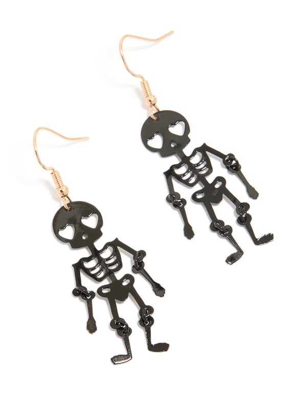 Statement drop earrings featuring heart eye skeleton in black and gold front view