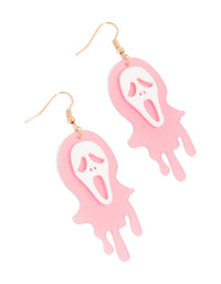 Discover statement drop earrings featuring pink acrylic melting ghost face with glitter accents in white and goldenrod tones front view - link has visual effect only