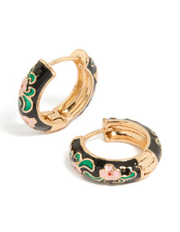 Featuring thick huggie earrings with floral pattern in enamel, statement style, gold and black with pink accents front view - link has visual effect only