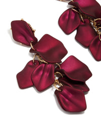 Designed with statement these burgundy coated metal petal drop earrings in maroon and gold close up view - link has visual effect only