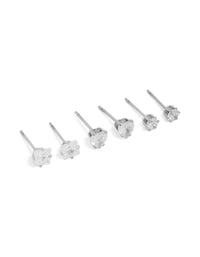 Showcasing waterproof stainless steel mixed stud earrings in a 3-pack featuring cubic zirconia with heart feature and round stone cut in silver finish front view - link has visual effect only