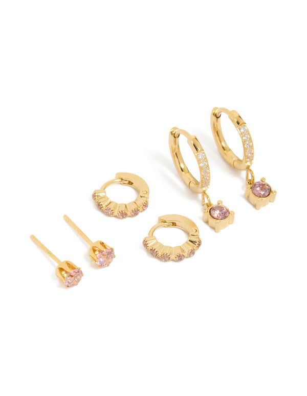 Showcasing waterproof gold plated stainless steel pink cubic zirconia mixed earrings with huggie and stud closures in a 3-pack front view