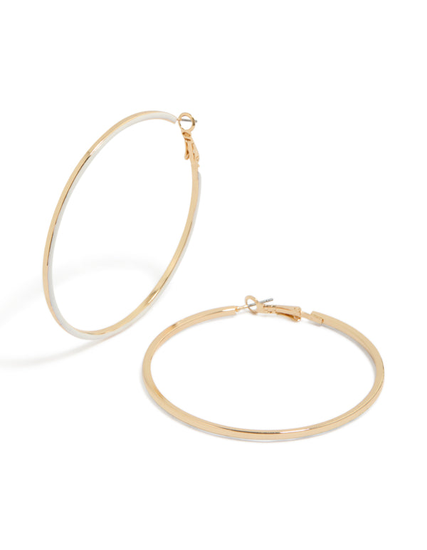 Showcasing white enamel outline hoop earrings crafted from gold material with hoop closure front view