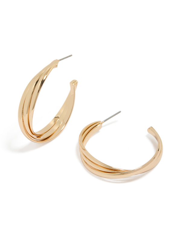 Showcasing chunky gold twisted hoop earrings with closure in front view